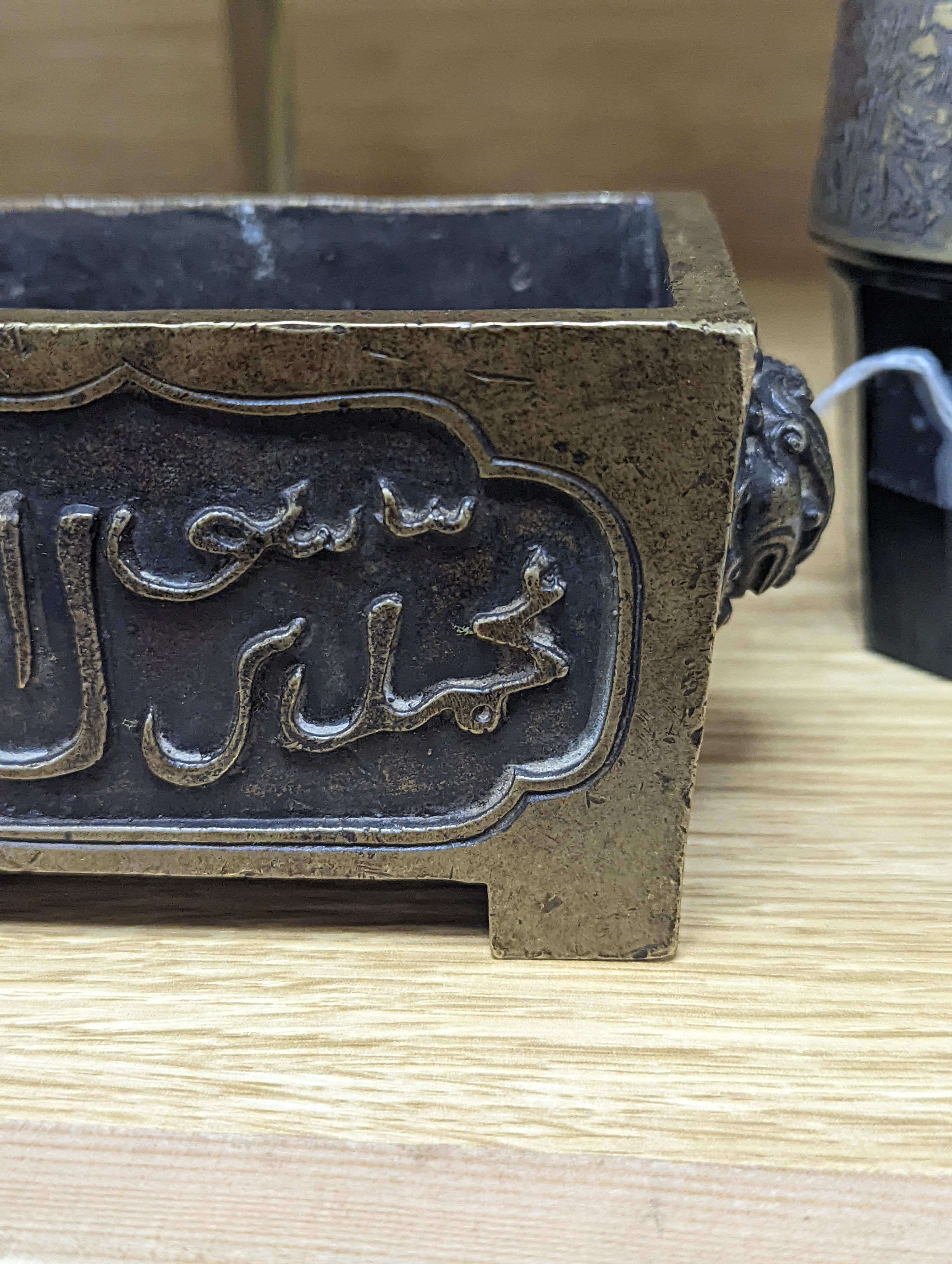 A Chinese bronze censer and a bronze boat